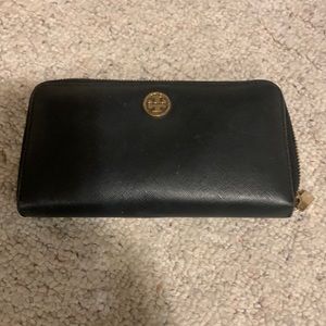 Tory Burch Black Wallet with Gold Logo and turquoise inside.